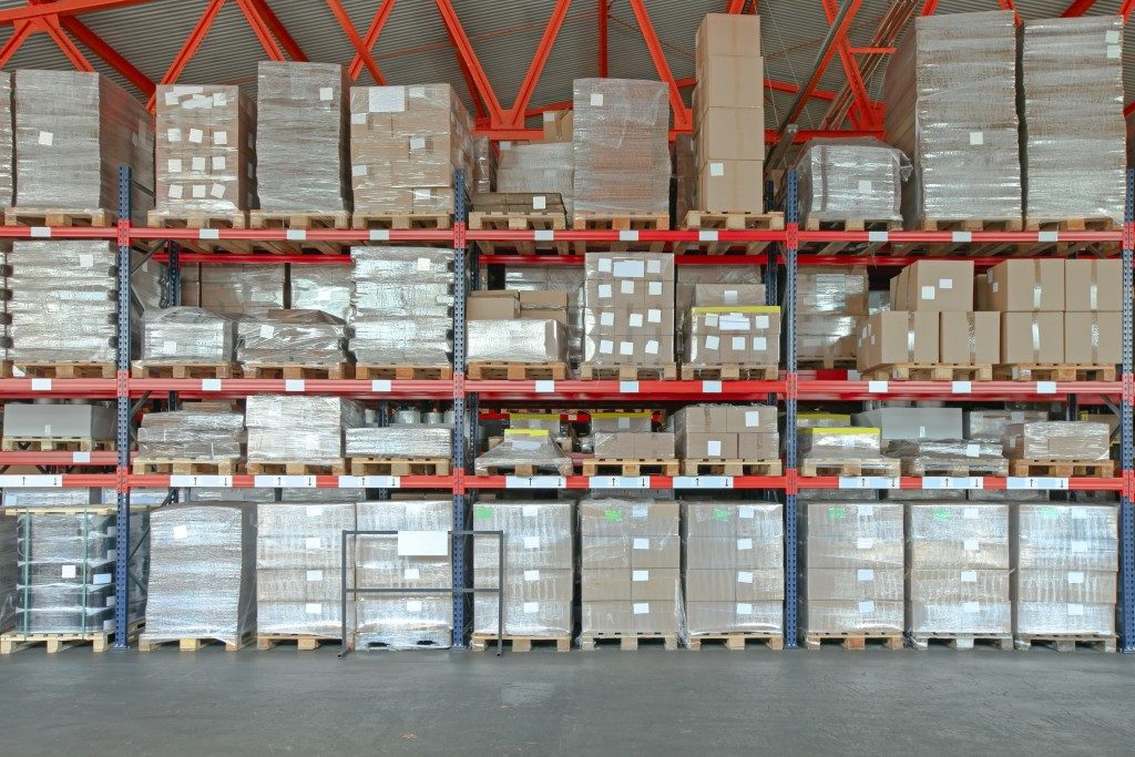 Shelving System With Boxes in Distribution Warehouse