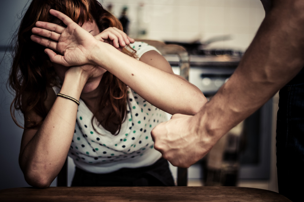 man about to punch his wife