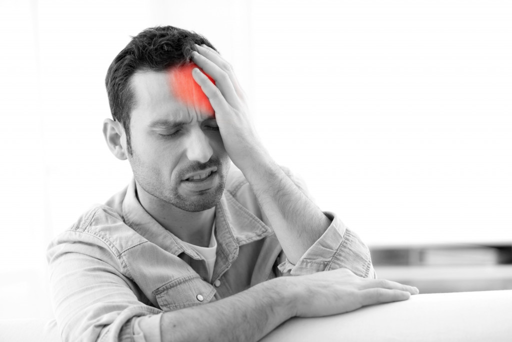 employee having a migraine