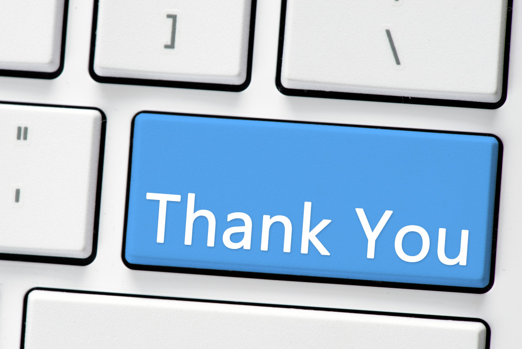 Blue THANK YOU button on keyboard