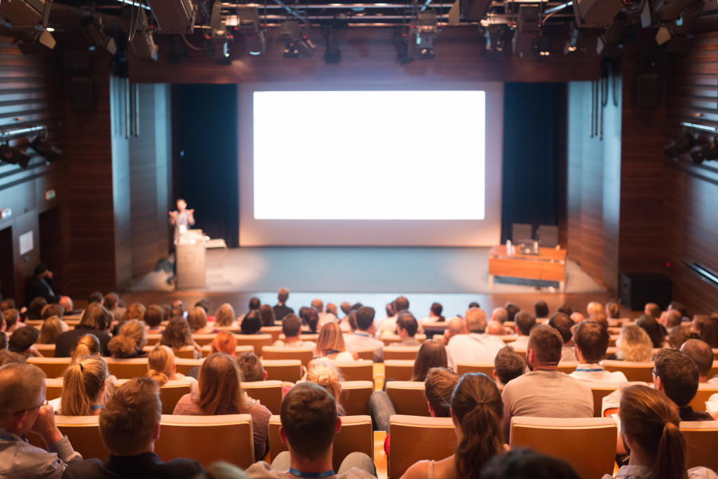 Image of audiences at a conference hall