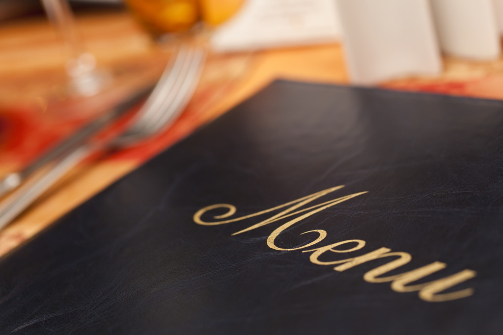 A restaurant menu at a dining table