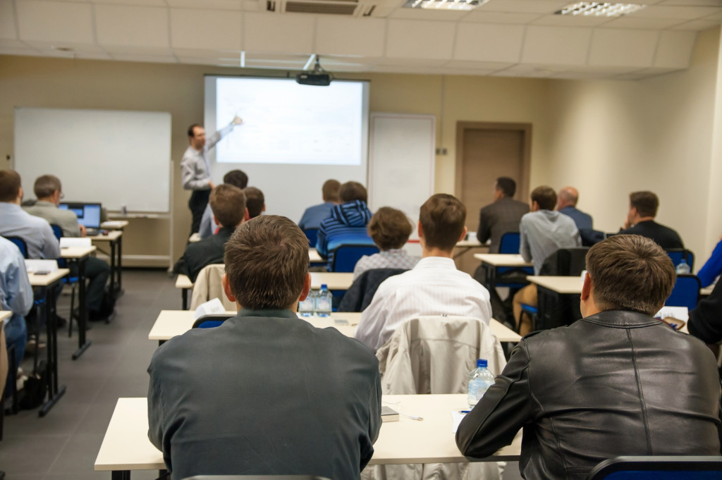 A group of businessmen attending a class